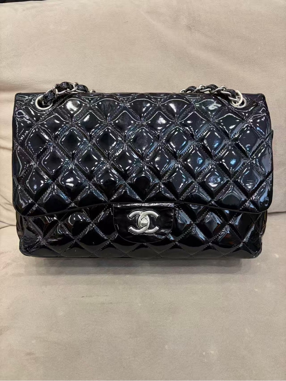 Chanel Classic double Flap bag jumbo in black quilted patent leather